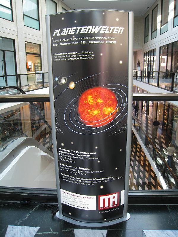 IMG_1003.JPG - Hey, that's our Solar System artwork in an ad for Planetenwelten.