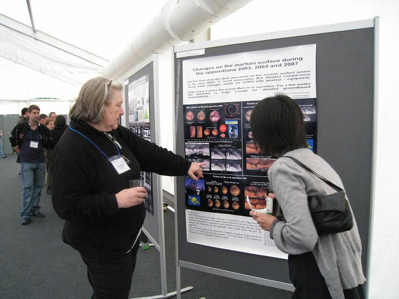 IMG_1021.JPG - That's Silvia Kowollic, a Cassini SOC member with her poster on Thursday afternoon