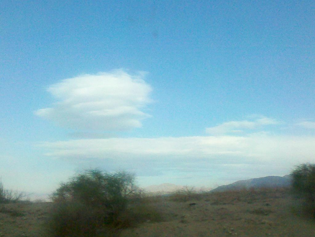2011-01-29-chuckwalla-122.jpg - Jane noticed and snapped this picture of stacked standing lenticulars sitting downwind of the mountain range.