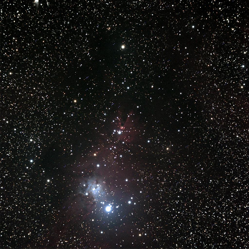 cone.jpg - The Cone nebula is the dark nebula near the center of the image, surrounded by emission, reflection, and dark nebulae in this wide field view.