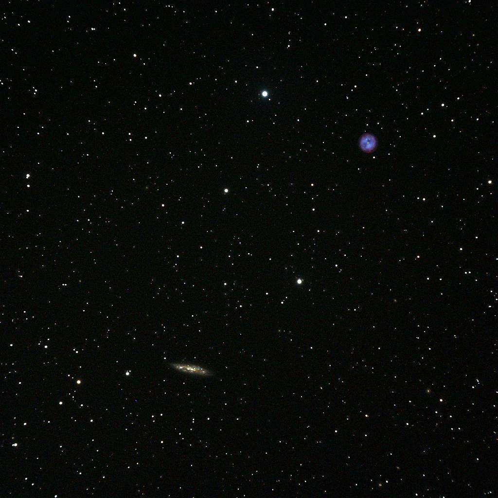 owl-m108.jpg - I love this shot of M97 (the Owl Nebula, upper right) and galaxy M108. It's interesting to contemplate the differences in distances. The Owl is in our own galaxy!