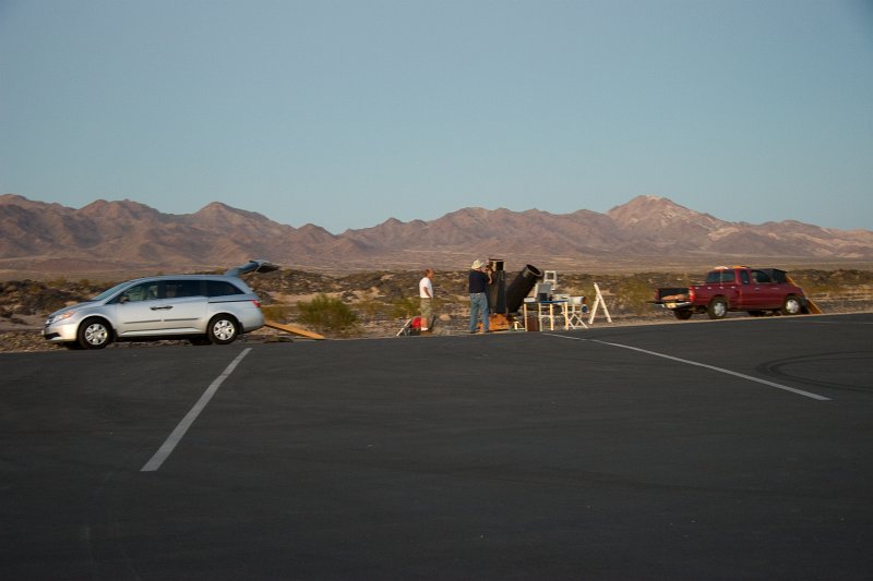 2011-10-amboy-109.jpg - View of the distant mountains behind Steve and Cliff setting up their dobs.