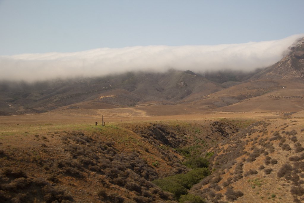 IMG_3047.jpg - Fog creeps over the coastal mountain range, in the southern part of Vandenberg AFB.