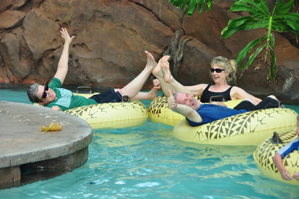 54029670000.jpg - Disney Photopass shot from our first day. Jane, Leslie and Mojo float on the Waikolohe Stream.