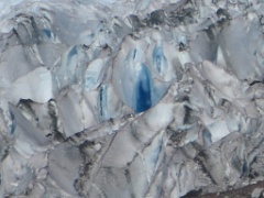 Up close of blue glacial ice.