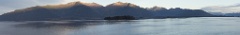 Sunrise catches the peaks on Admiralty Island, steaming slowly into Juneau.