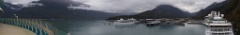 Panorama of Skagway Harbor. Three other ships in port, the Silversea Silver Shadow, a ferry Columbia, and a Royal Caribbean sister ship Radiance of the Seas.