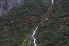 Long stream of waterfalls on the south wall of Endicott Arm.