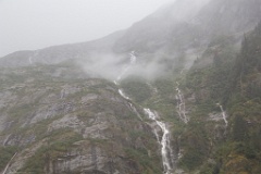 Waterfalls everywhere in the rainy mist at Endicott Arm.